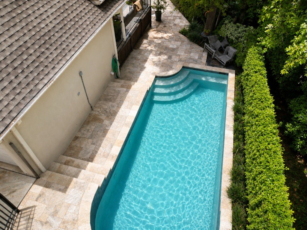 Clean travertine pool deck and patio