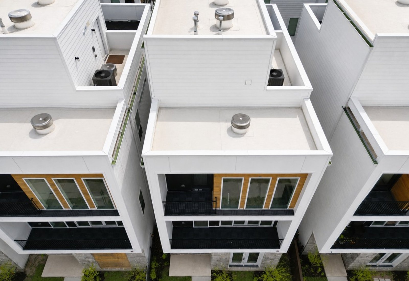 Clean flat rooftops on townhomes